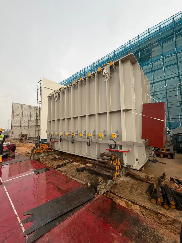Transformer positioning support system prepared for controlled industrial handling.